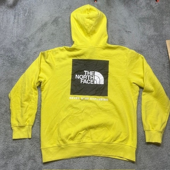 North Face Hoodie Mens Large Yellow Black Pullover Never Stop Exploring *SPOTS - Picture 1 of 13